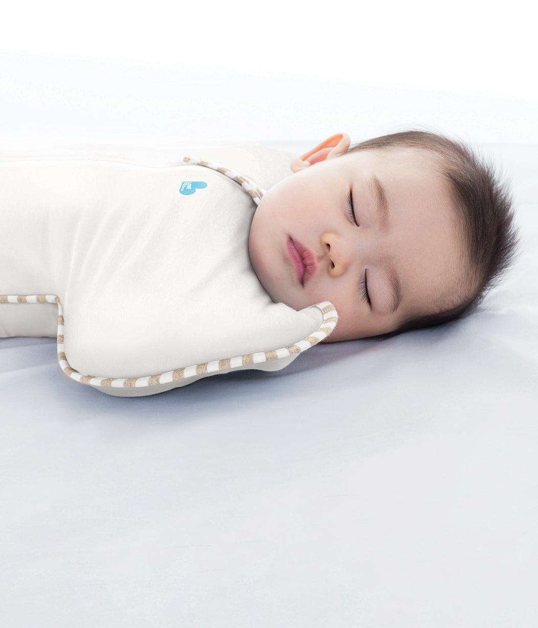 Love to Dream’s Swaddle Up™ is the only zip-up swaddle with patented “wings” that allows your baby to sleep in a natural Arms Up™ position for true Self-Soothing™. Made with organic fabric, the Swaddle Up™ Organic is dreamily soft on delicate skin, and with a 1.0 TOG fabric, it's perfect for moderate climates between 20°C and 24°C.