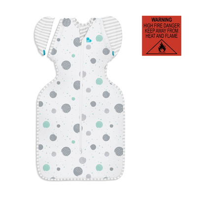 The Swaddle Up™ Transition Bag 0.2 TOG helps your baby to gradually adjust to sleeping un-swaddled. Simply unzip one wing – either as baby sleeps or when dressing them – for a few sleep cycles to help them get used to the sensation of sleeping with one arm free. Then complete the transition by removing the second wing!