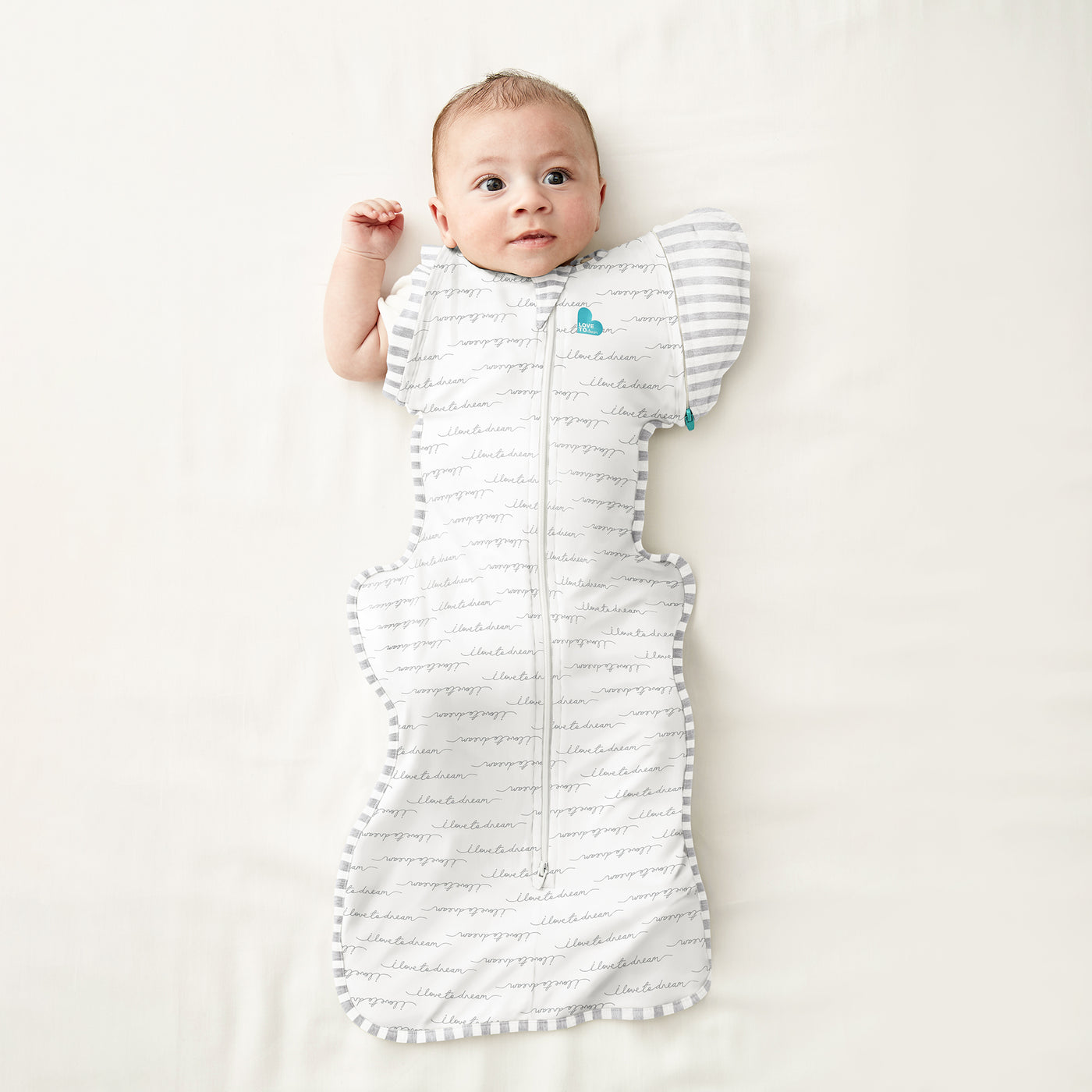 The Swaddle Up™ Transition Bag helps your baby to gradually adjust to sleeping unswaddled. Simply unzip one wing – either as baby sleeps or when dressing them – for a few sleep cycles to help your baby get used to the sensation of sleeping with one arm free. Complete the transition by simply removing the second wing!