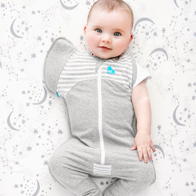 As soon as your baby starts showing signs of trying to roll, you must transition to “arms-free” sleep. This change can be upsetting for some babies, but there is a way to help ease the transition. The five-piece Swaddle Up™ Transition Suit 1.0 TOG helps your baby to gradually adjust to sleeping un-swaddled.