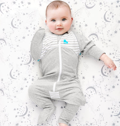 As soon as your baby starts showing signs of trying to roll, you must transition to “arms-free” sleep. This change can be upsetting for some babies, but there is a way to help ease the transition. The five-piece Swaddle Up™ Transition Suit 1.0 TOG helps your baby to gradually adjust to sleeping un-swaddled.